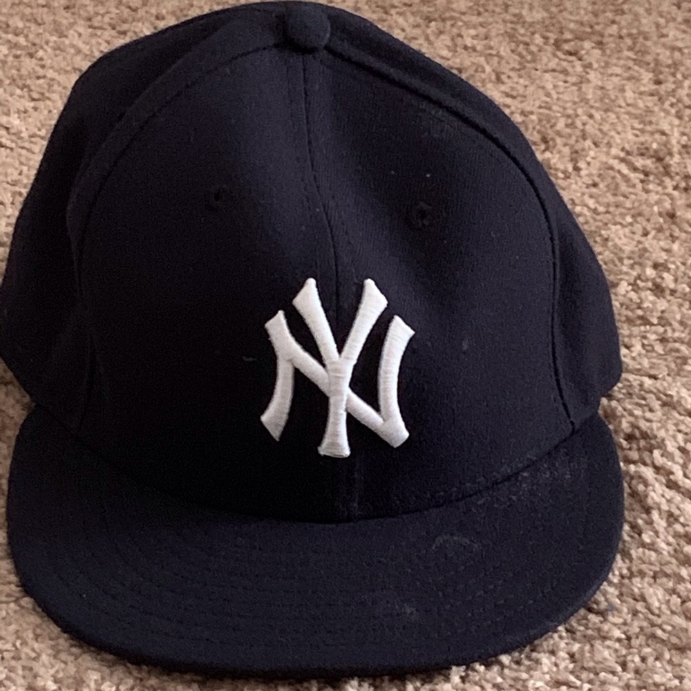NY Yankees hat.
